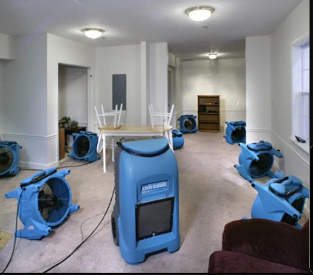 Air movers and dehumidifier setup for Water Extraction & Removal in Clearfield